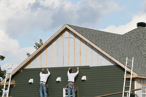 Professional Vinyl Siding technician working in Petersburg, IN
